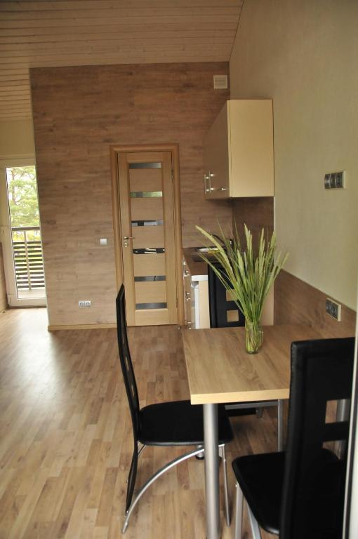 Apartamentai Trys Pusys Šventoji Chambre photo